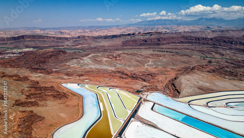 A large body of water with a blue section in the middle