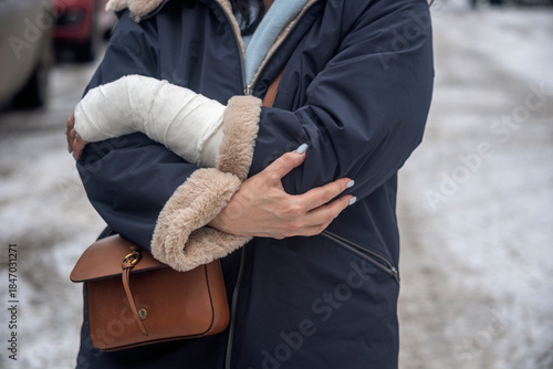 woman with a plaster on her arm