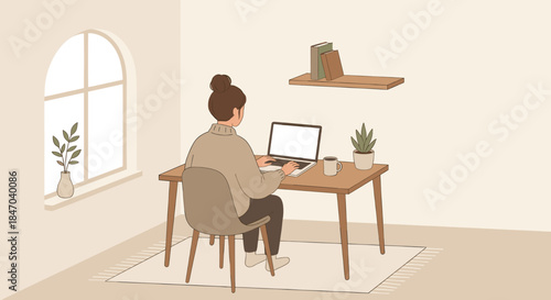 A woman working on a laptop at a wooden desk in a cozy home office with a window and plants.