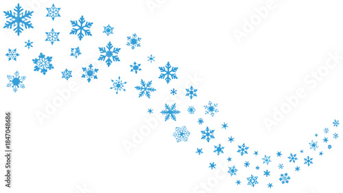 Blue snowflakes falling gently in a diagonal stream