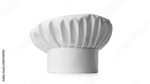 White chef's hat with pleats, standing alone against a stark white background