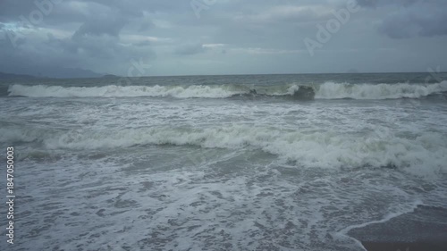 Beautiful ocean landscape  with dramatic clouds and  waves. Slow motion