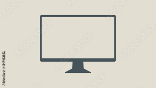 Modern computer monitor on beige background for office workspace