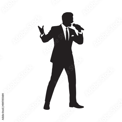 Silhouette of a man in a suit singing into a microphone on stage