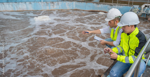 Quadro su tela Environmental engineers work at wastewater treatment plants,Water supply enginee