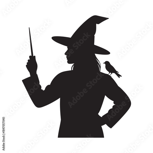 Silhouette of a witch holding a wand with a bird companion nearby