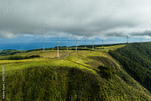 Canvas-taulu Wind turbines on green volcanic hills of Sao Miguel Island under variable clouds