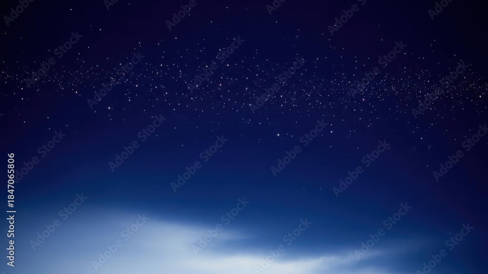 Fototapeta premium Christmas Deep blue night sky with faint stars and fading horizon light