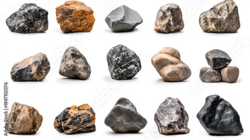 A collection of fifteen rocks of various colors and textures are arranged on a white background. AI.