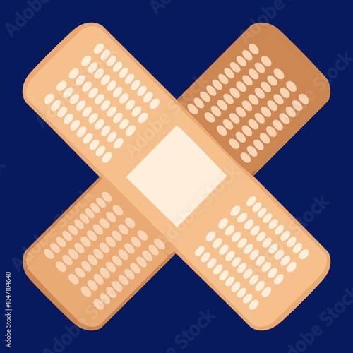 Two adhesive bandage strips crossed in an X shape for first aid medical treatment and wound care protection concept