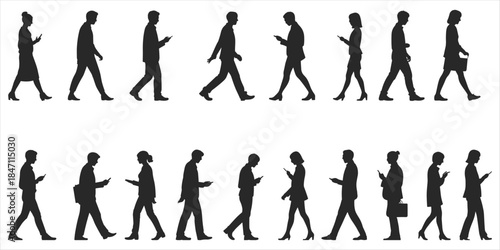 Silhouette of people walking and looking at their mobile phones smartphone