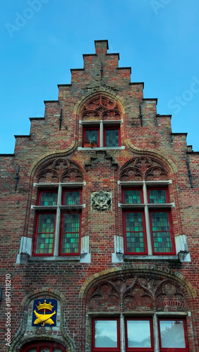 Medieval architecture on the autumn streets of historic center of Bruges, Belgium, October 20, 2025.