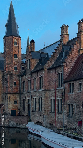 Medieval architecture on the autumn streets of historic center of Bruges, Belgium, October 20, 2025.