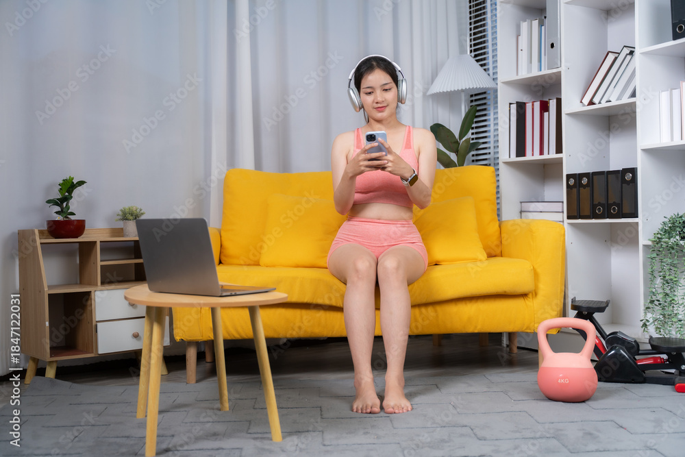 Obraz premium young woman sitting on a sofa