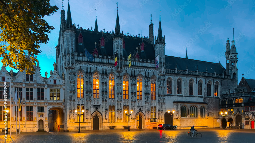Obraz premium Medieval architecture on the autumn streets of historic center of Bruges, Belgium, October 20, 2025.