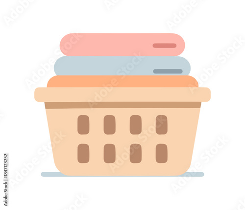 Colorful laundry basket with towels in flat design for home organization