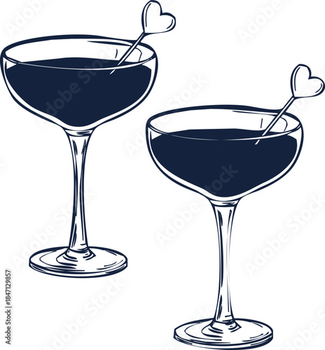 Two Dark Blue Coupe Cocktail Glasses with Heart Stirrer on White Background drink beverage