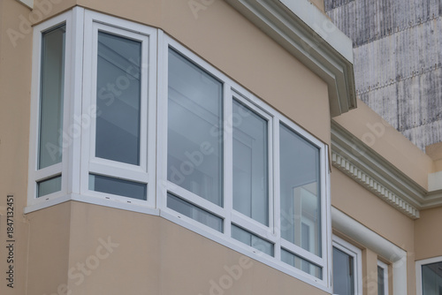 Modern bay window on building facade architecture