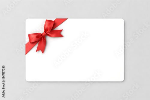 Clean white greeting card featuring a red ribbon bow in the upper left corner for festive holiday celebrations and corporate gift giving season mockup