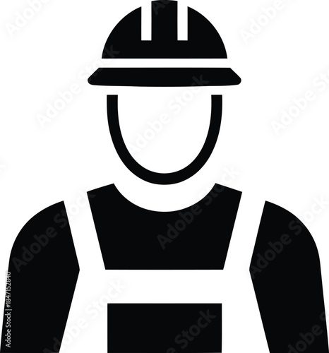 Black silhouette of a construction worker in hard hat and overalls