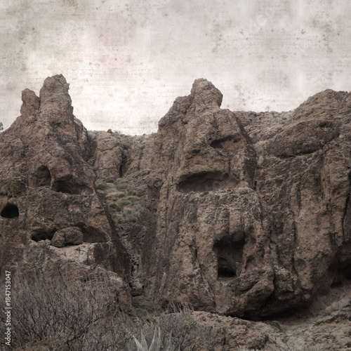 textured stylish old paper background, square, with landscape of central Gran Canaria, route to Ventana de Bentayga