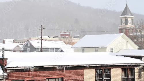 USA town rooftops covered in snow, authentic day, winter snow.