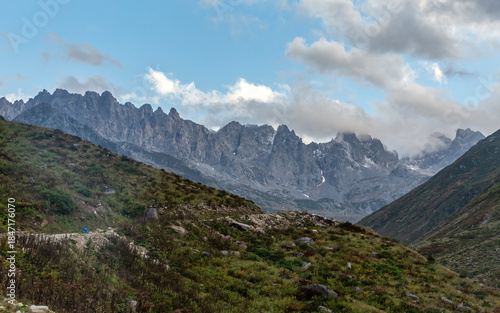Altıparmak Mountain, a continuation of the Kaçkar Mountains, and a flock of sheep grazing in the tents in the valley...