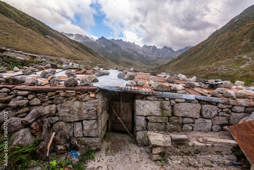 A house in the highlands of the Eastern Black Sea region where livestock breeders stay during the summer months, with a view of the mountains...