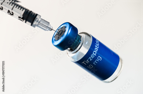 Close up of Tirzepatide Vial and Single Use Insulin Syringe