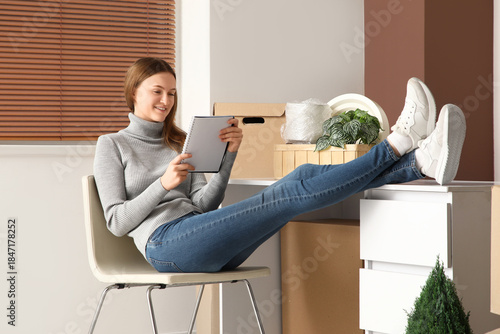 Young woman with notebook s...