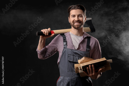 Handsome lumberjack with ax...