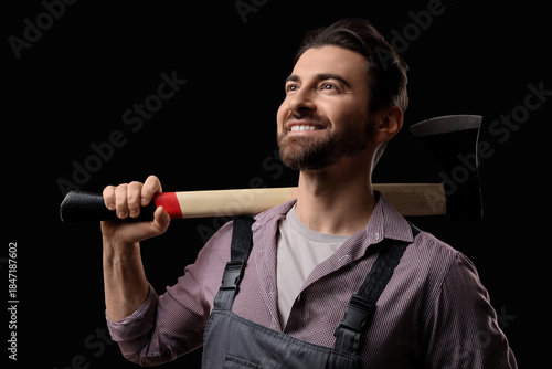 Handsome lumberjack with ax...