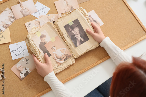 Woman making family tree at...