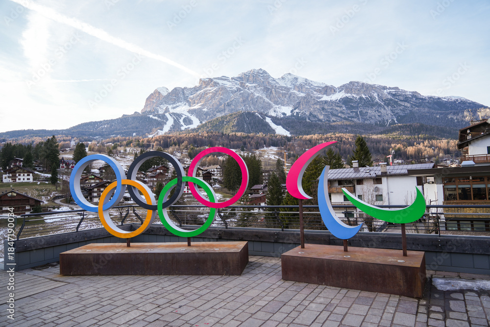 Fototapeta premium CORTINA D'AMPEZZO, ITALY - December 12, 2025: The logo with the Olympic rings in Cortina 2026 is for the 25th Olympic Winter Games.