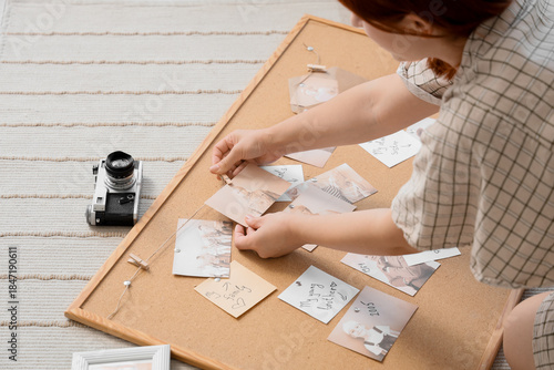 Woman making family tree at...