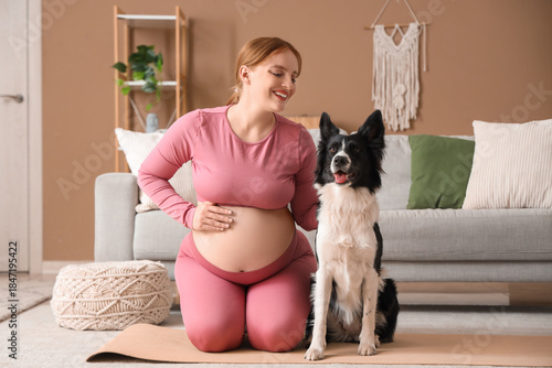 Sporty young pregnant woman...