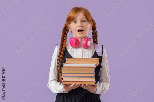 Surprised redhead schoolgir...