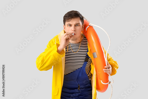 Male sailor with rescue rin...