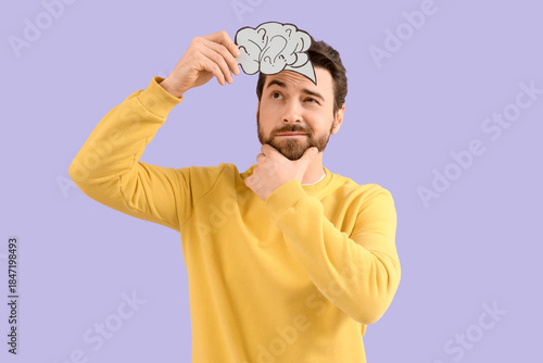 Thoughtful bearded man hold...