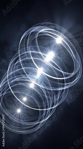 Multiple glowing, translucent rings are stacked and aligned vertically, creating an ethereal, light-filled tunnel effect.