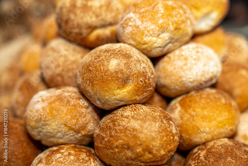 Wallpaper Mural Freshly baked bread rolls in a wooden basket, perfect for breakfast or bakery product marketing, delicious golden crust and soft texture. Mini bread baguettes in basket. pieces to accompany food Torontodigital.ca
