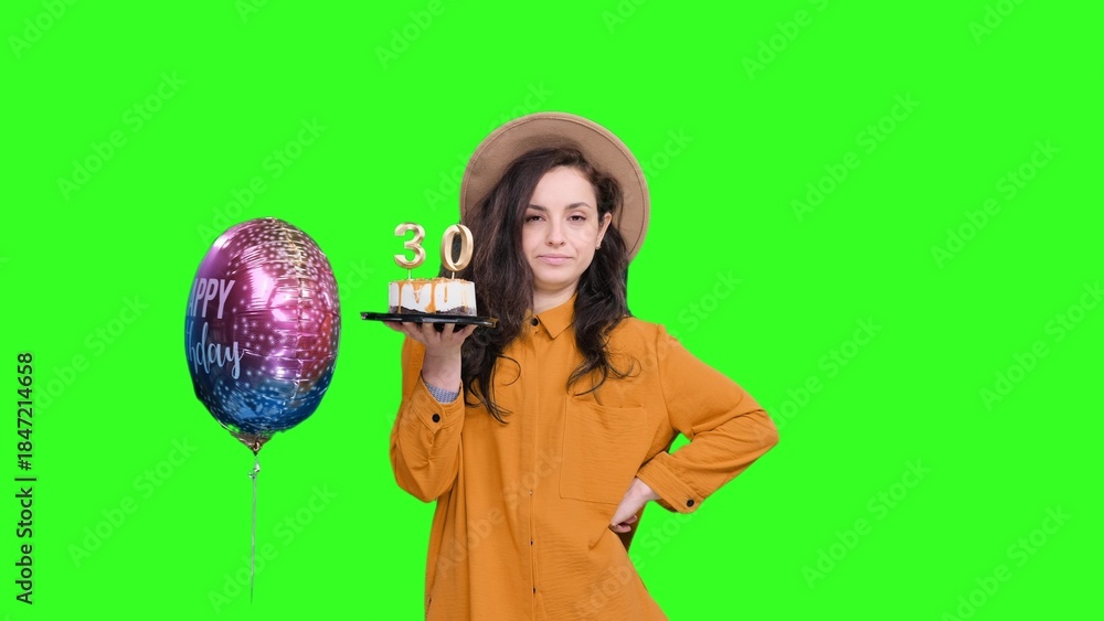 Fototapeta premium Stylish woman celebrating with birthday cake with number 30 on the chroma key
