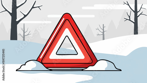 Emergency triangle on snow-covered ground in winter landscape  