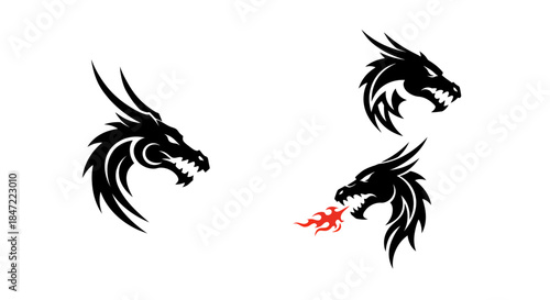 Three powerful black dragon head vector illustrations, one breathing fire, depict mythical creatures with a fierce, tribal artistic style, perfect for various design projects.