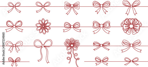 A collection of red ribbons and bows arranged in a decorative pattern on a white background