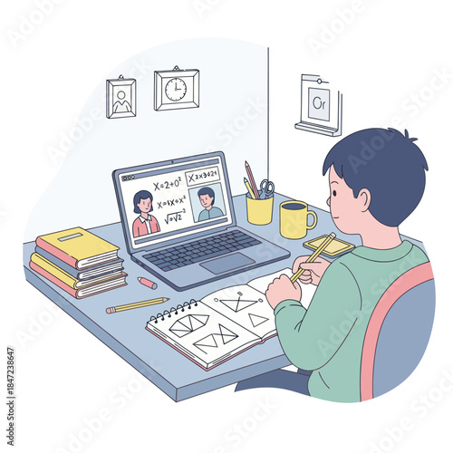Boy studying online on laptop at desk.