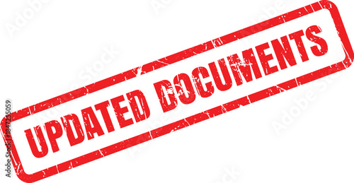 A striking red rubber stamp boldly presents the phrase UPDATED DOCUMENTS on a clean white surface