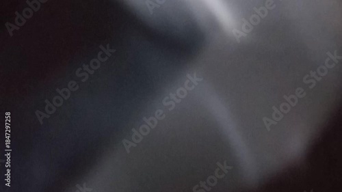 High Velocity White Smoke Blast Swirling on Black Background