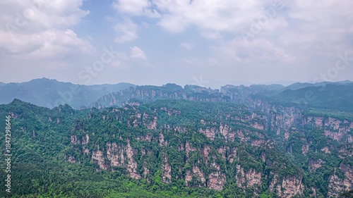 Aerial Time Lapse of Zhangjiajie Wulingyuan National Park Limestone Peaks and Forest Valleys China