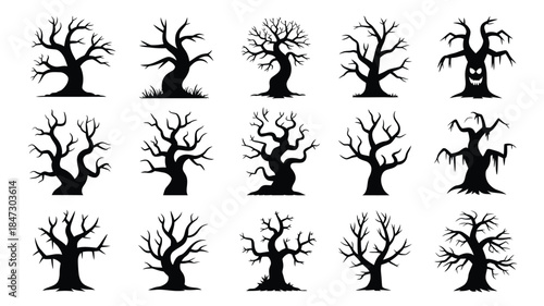 A collection of fifteen eerie black bare tree silhouettes with twisted branches for a haunted scene